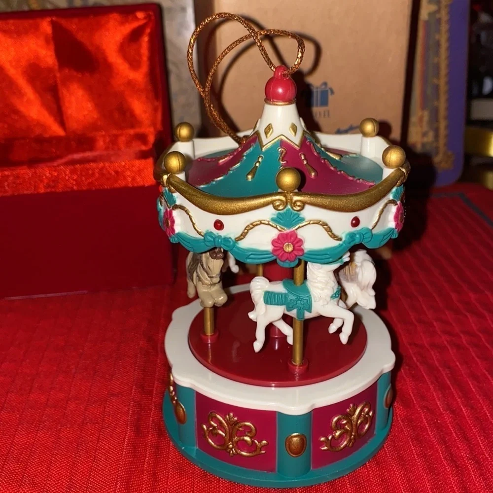 Holly Collections 2005  Angel Water Globe and Avon gift collections Carousel